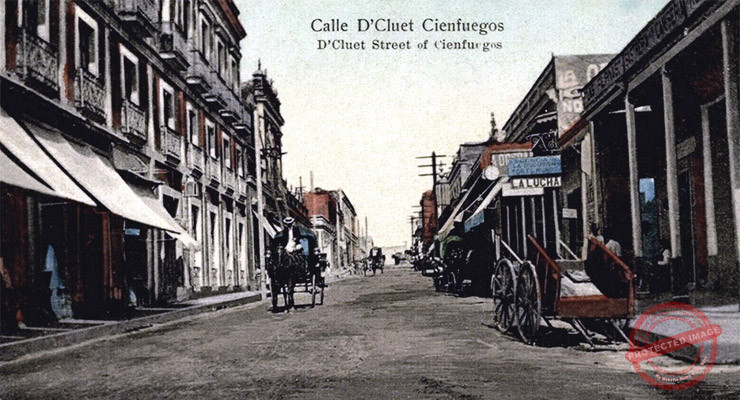 Calle De Clouet y negocios existentes en Cienfuegos, situado en la antigua provincia de Las Villas (Ca. 1909).