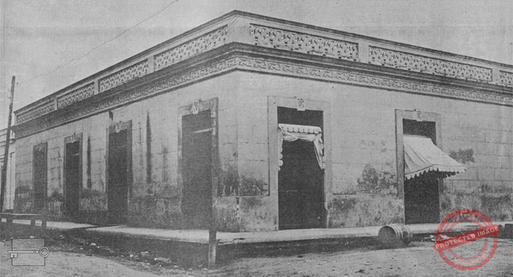 Gómez y Compañía S. en C., vista del edificio de la firma importadora de víveres en Manzanillo, Cuba ca. 1918.