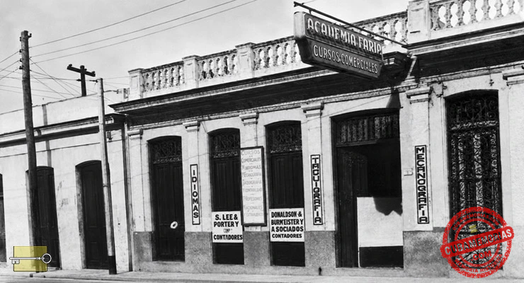 Fachada de Faria Academy en Infanta No. 1059, La Habana, con rótulos de cursos comerciales, idiomas, taquigrafía y mecanografía.